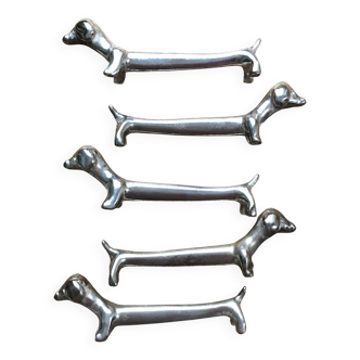 Ensemble de cinq porte couteaux vintage en forme de chien basset