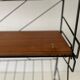 Free-standing shelf with a metal structure and 3 shelves, 1960s, Italy.
