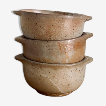 Three bowls in ancient sandstone