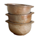 Three bowls in ancient sandstone