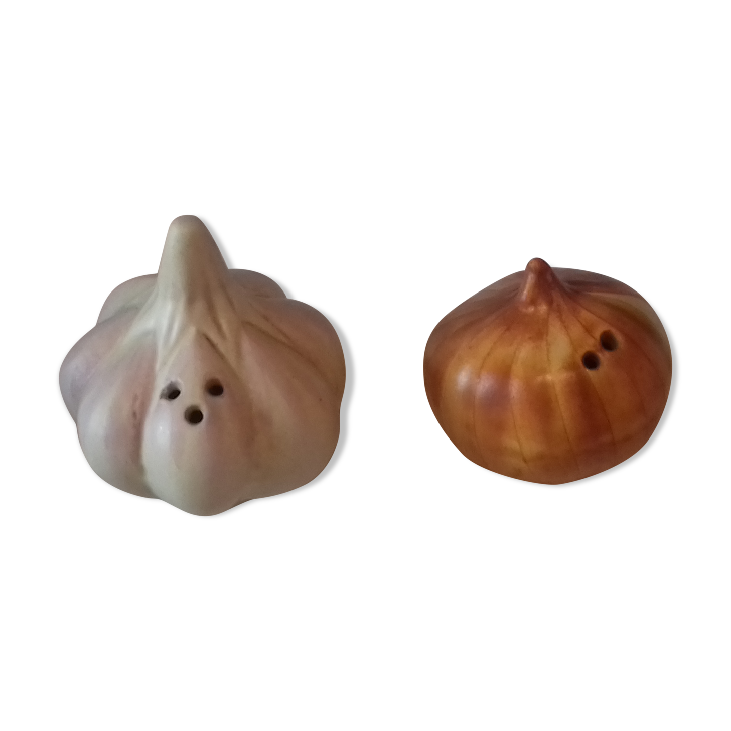 Pepper salt shaker in the shape of garlic and onion head