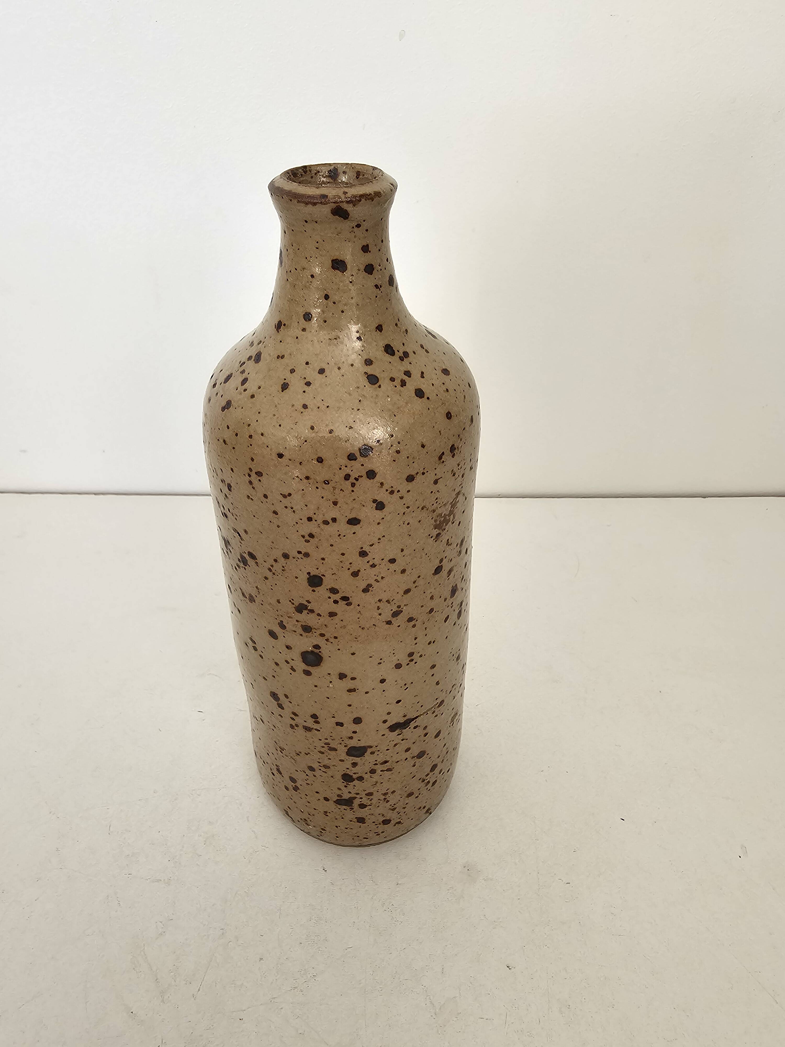 Pyrite stoneware single-flower vase in the shape of a bottle signed Aular?