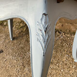 Louis XV style walnut table with a natural wood top.