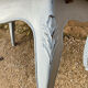 Louis XV style walnut table with a natural wood top.