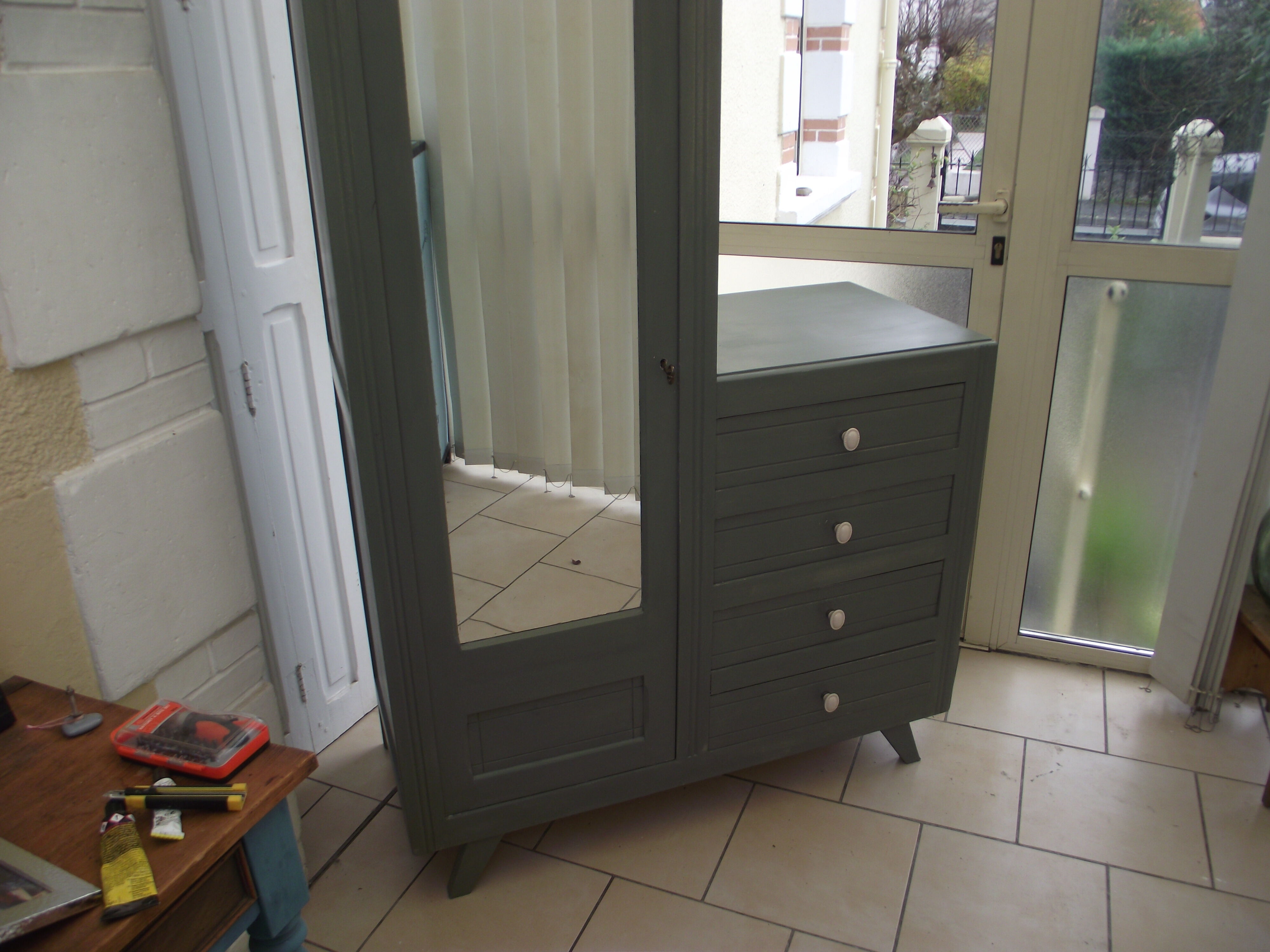 Asymmetrical cabinet from the 50s