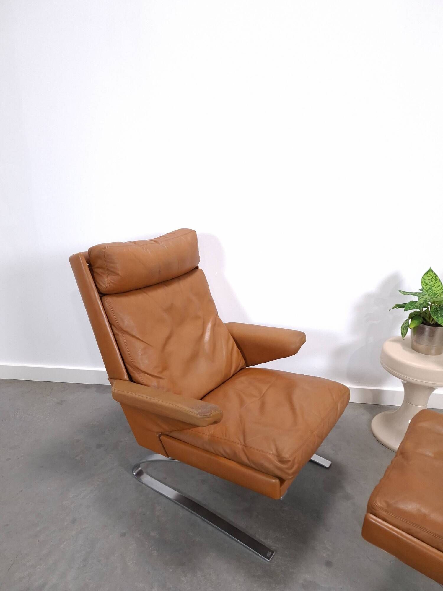 Vintage COR Swing armchair with ottoman, Reinhold Adolf, cognac leather