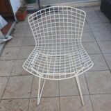 Chairs and footrest by Harry Bertoia