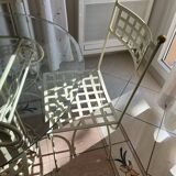 Wrought iron round table and 4 chairs
