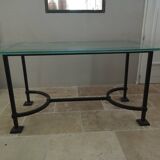 Table plateau en verre et pieds en fer forgé