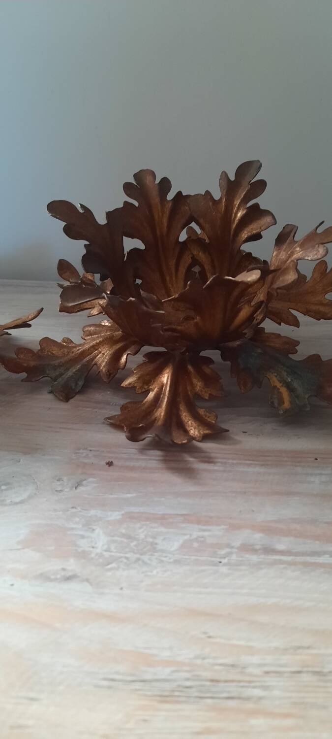 Pairs of golden foliage-style wall lights