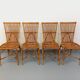 Set of 4 vintage Audoux Minet rattan chairs from the 1950s and 60s.