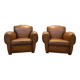 Pair of art deco leather club armchairs