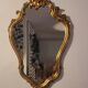 Miroir en bois d'or à  l or,style Louis 15