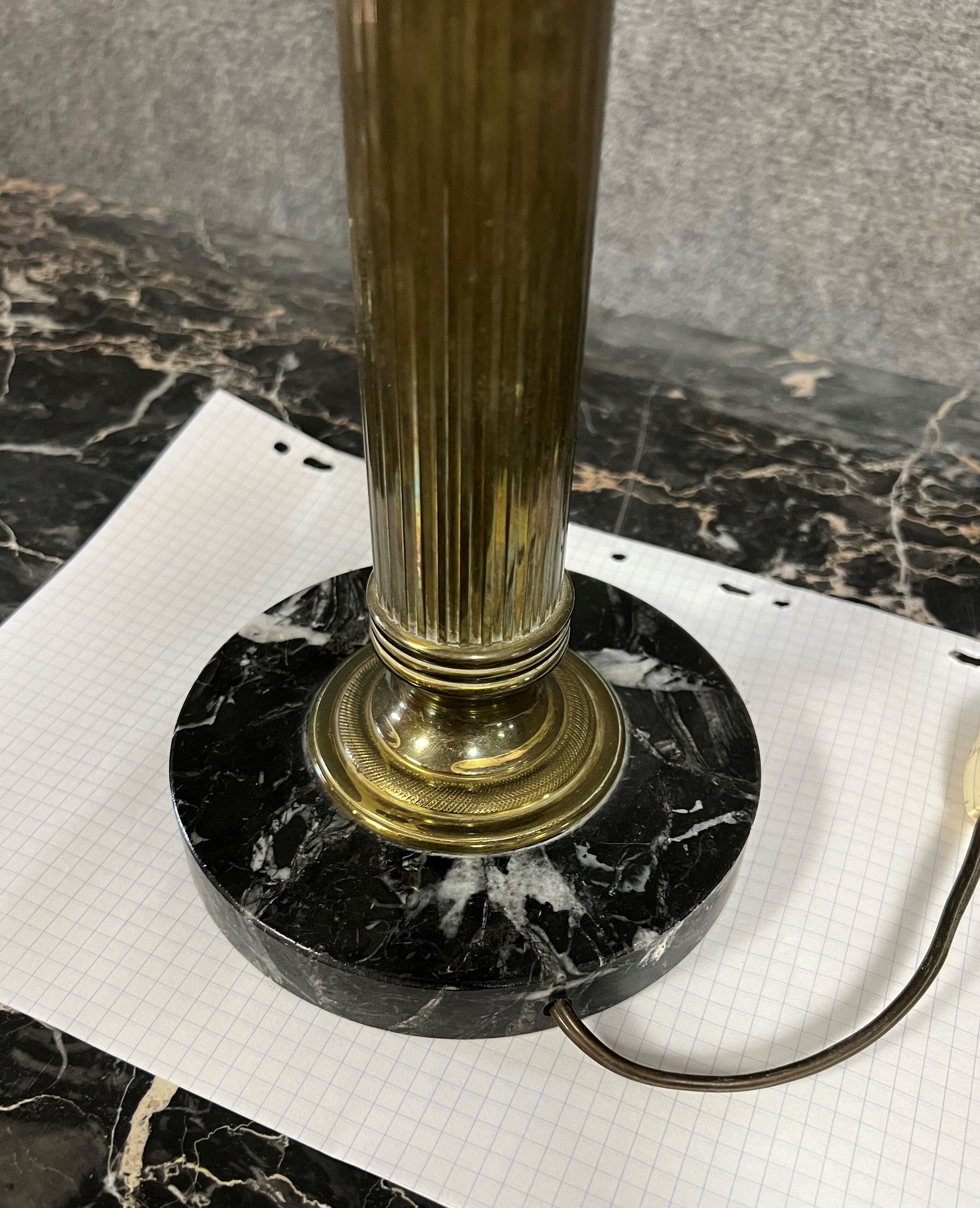 Lamp foot in gilded brass and black marble Louis XVI era around 1900