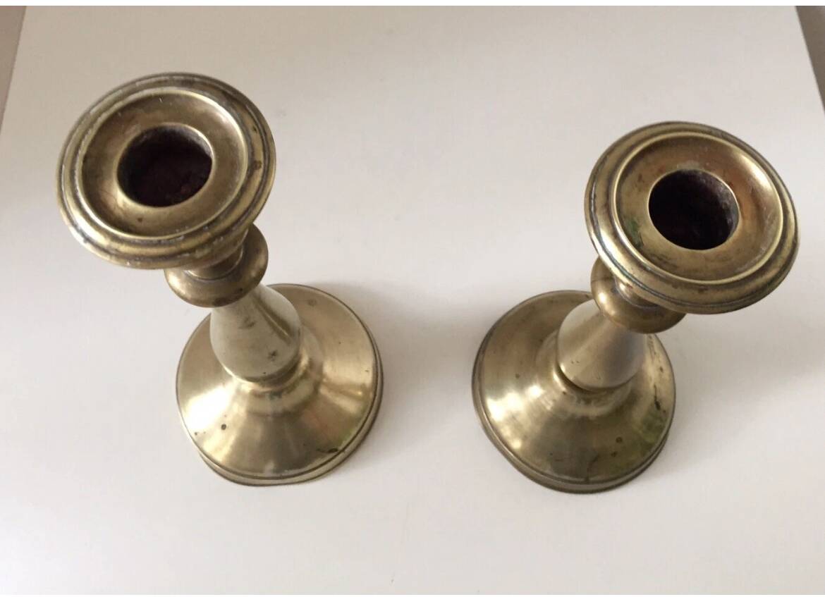 Pair of antique gilt brass candlesticks
