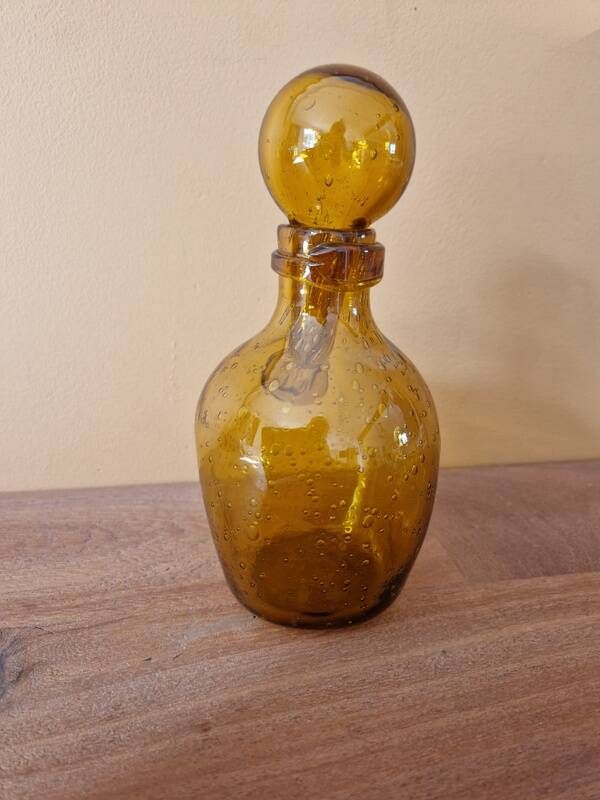 Biot perfume bottle or bubbled glass bottle in amber colour, 1970s design.