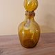 Biot perfume bottle or bubbled glass bottle in amber colour, 1970s design.