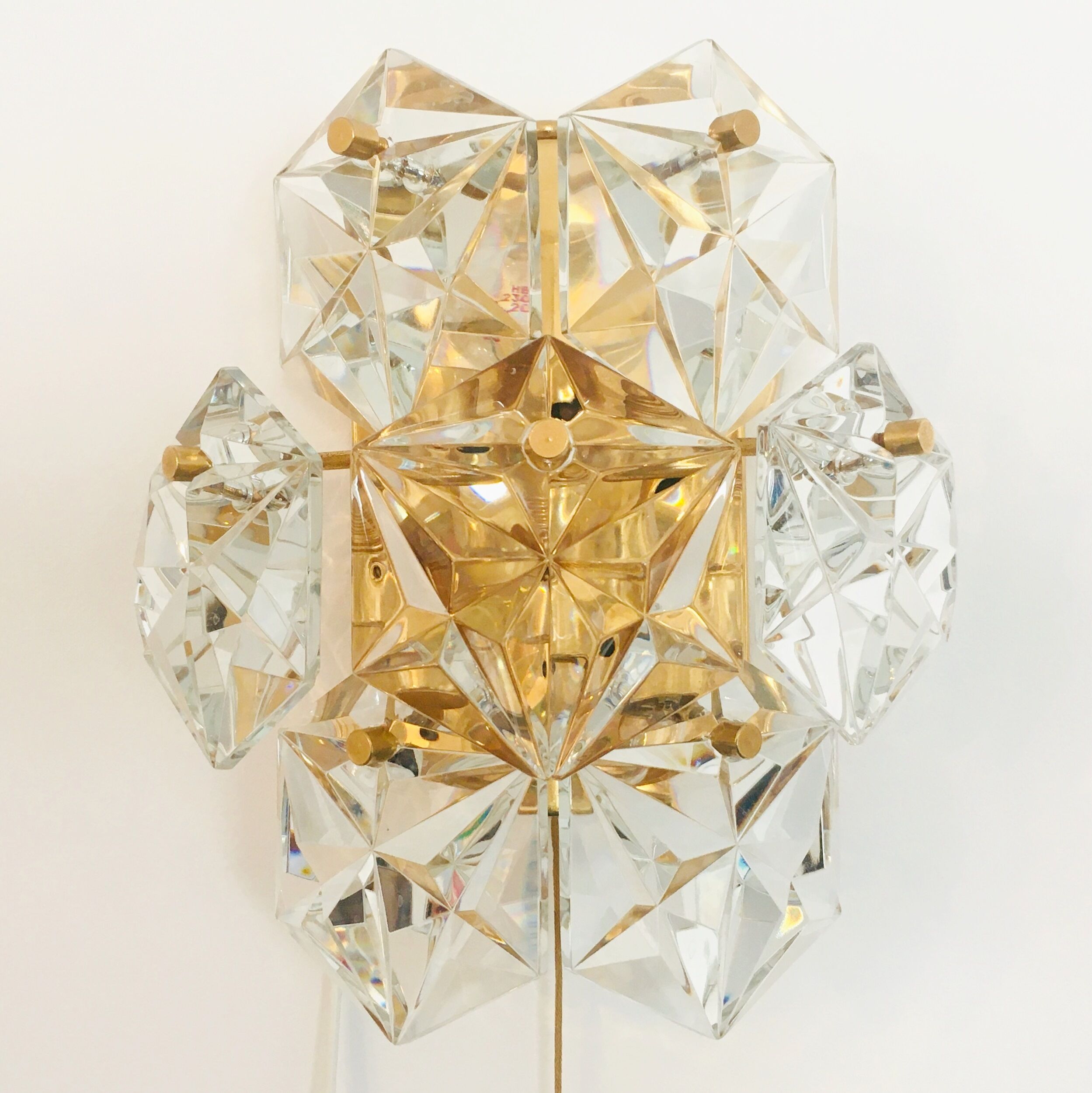 Pair of faceted crystal wall lights / sconces by Kinkeldey, Germany, 1970s