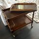 Wooden and brass rolling trolley