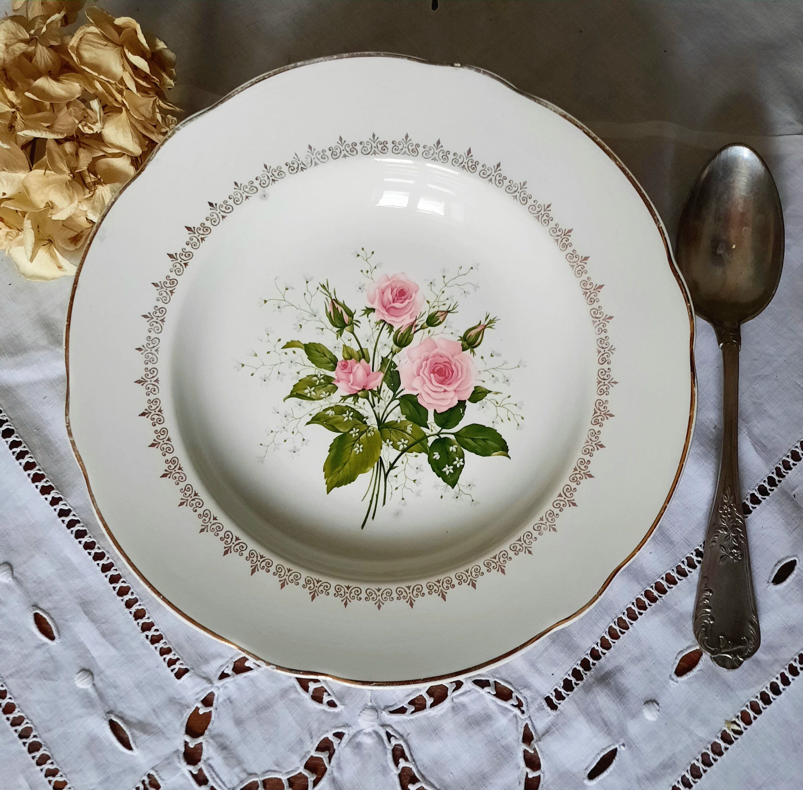 Old hollow plates mismatched in earthenware