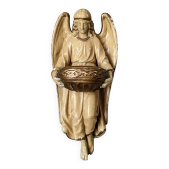 Antique ceramic holy water font with winged angel, religious object, country decoration