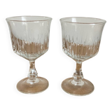 2 stemmed glasses