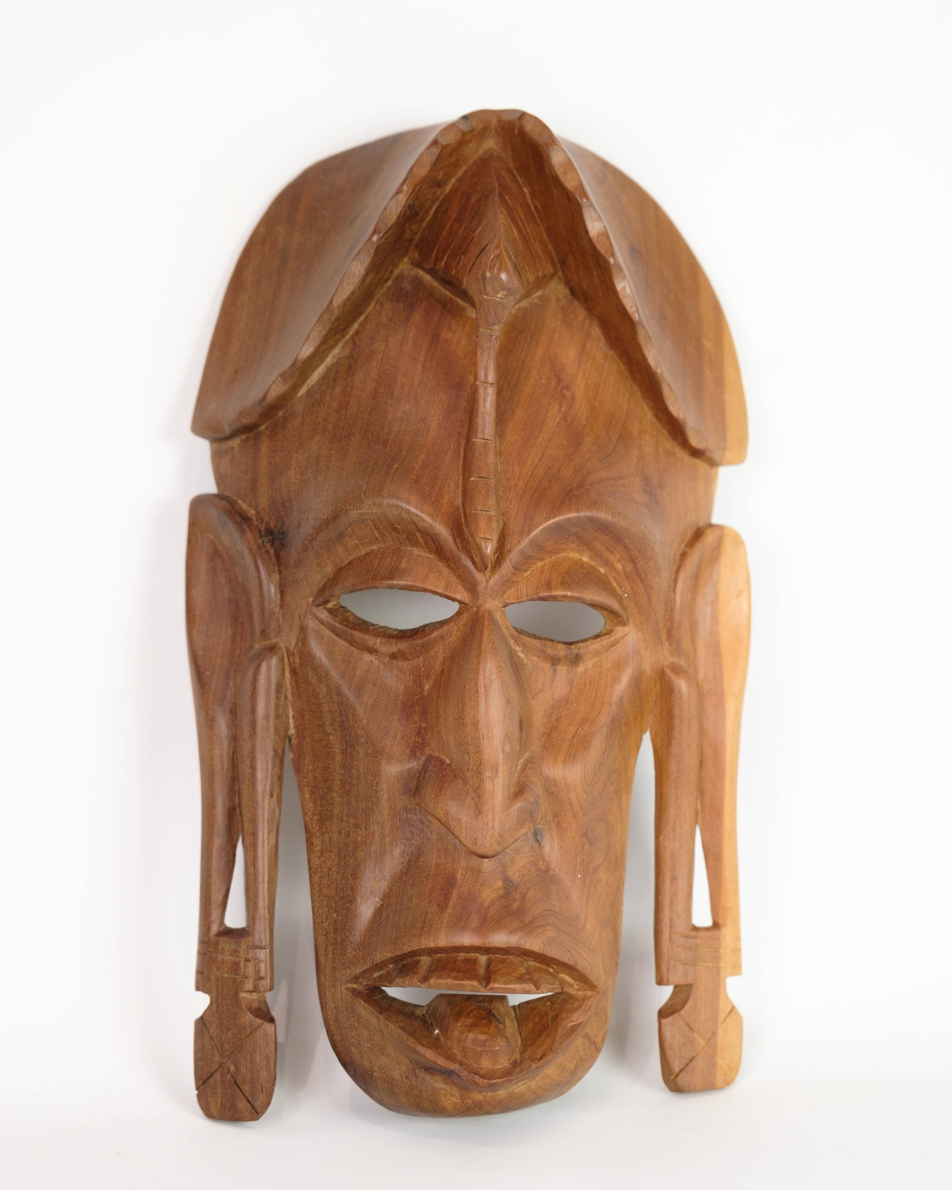 African Mask Hand Carved In Light Wood From West Africa