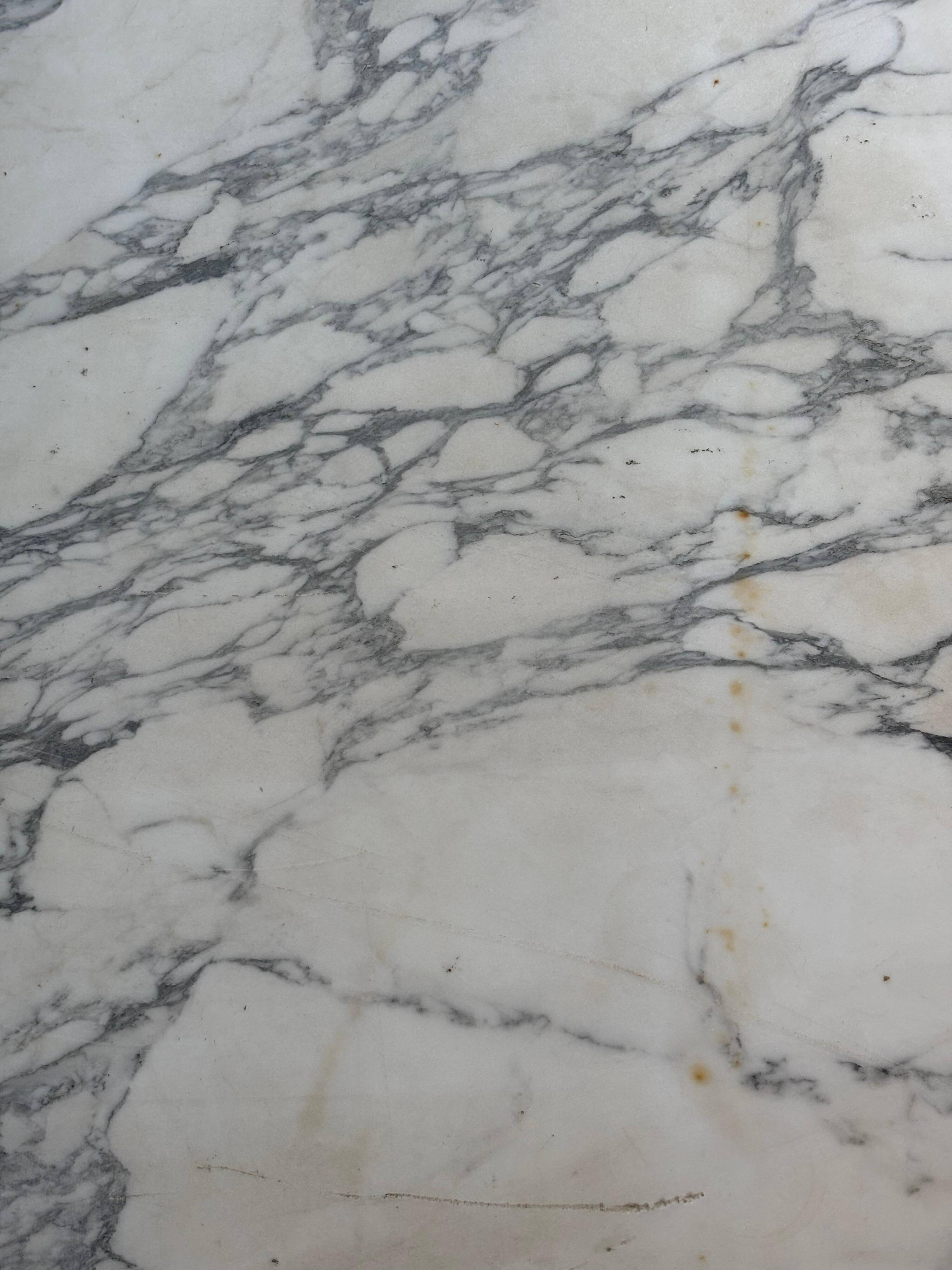 Oval table in white marble