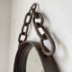 Brutalist mirror with metal chain from the 50s