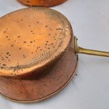 Lots of tinned copper kitchen utensils