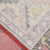 Tapis turc en laine rose poussiéreux
