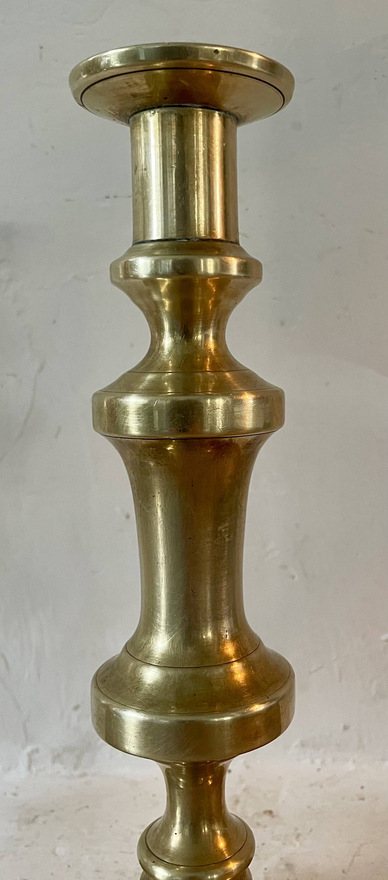 Pair of brass candlesticks from the 19th century.