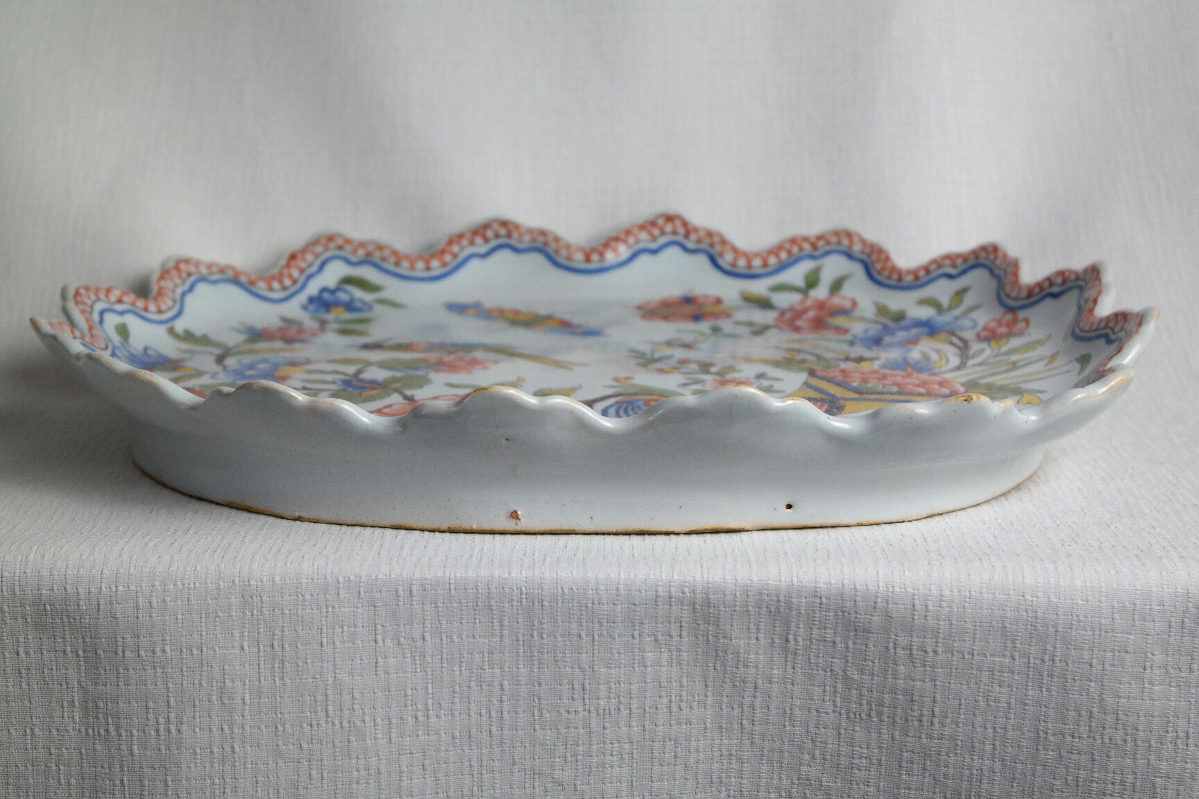 Flat earthenware of Rouen polychrome decoration cornucopia of plenty