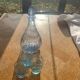 Liquor service consisting of a blue glass decanter and. 3 small antique glasses