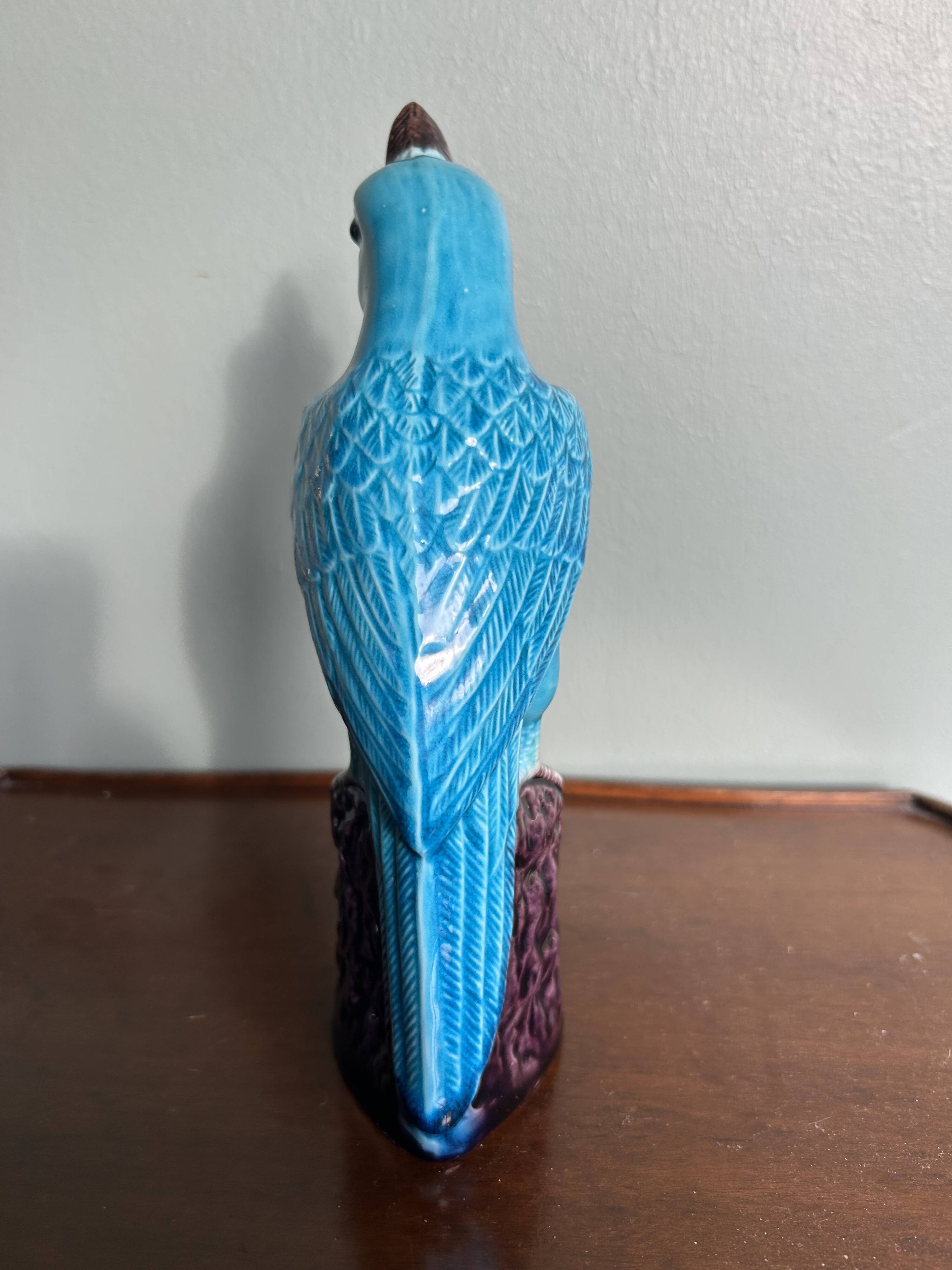 Porcelain parrot statuette