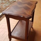 Wooden side table on casters