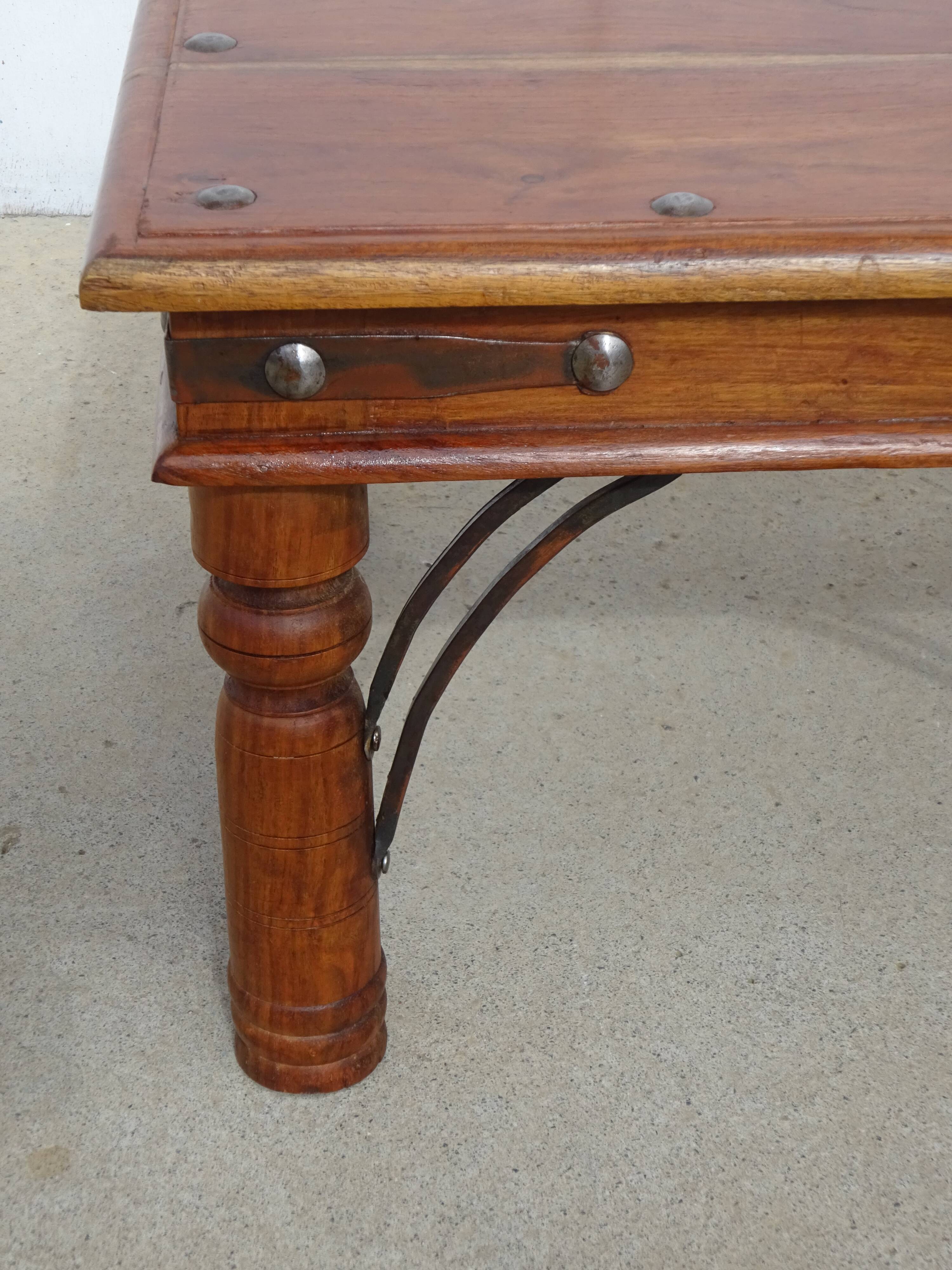 Square coffee table in exotic wood and wrought iron.