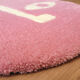 Tapis rond visage rose 54x54cm