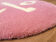 Tapis rond visage rose 54x54cm