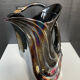 Iridescent ceramic pitcher from Bassano, Italy, from the 1970s.