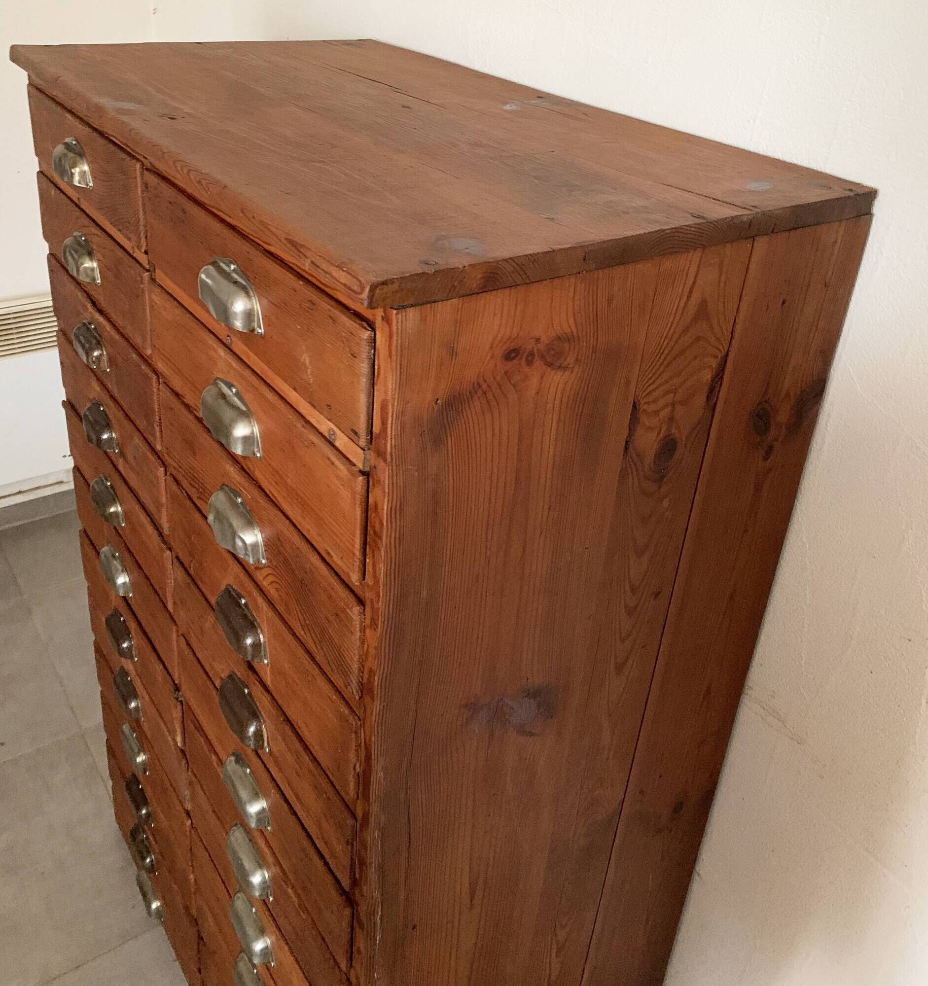 Old apothecary trade furniture in vintage wood 24 drawers.