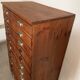 Old apothecary trade furniture in vintage wood 24 drawers.