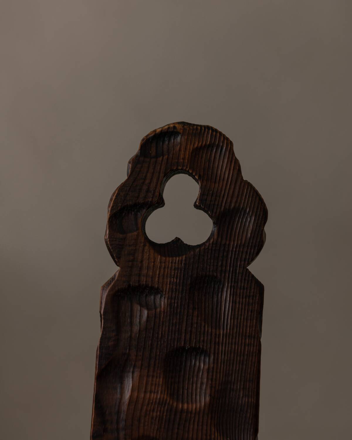 Spanish brutalist tripod chair in carved solid wood