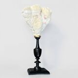 Natural white coral on a black wood base curiosity cabinet.