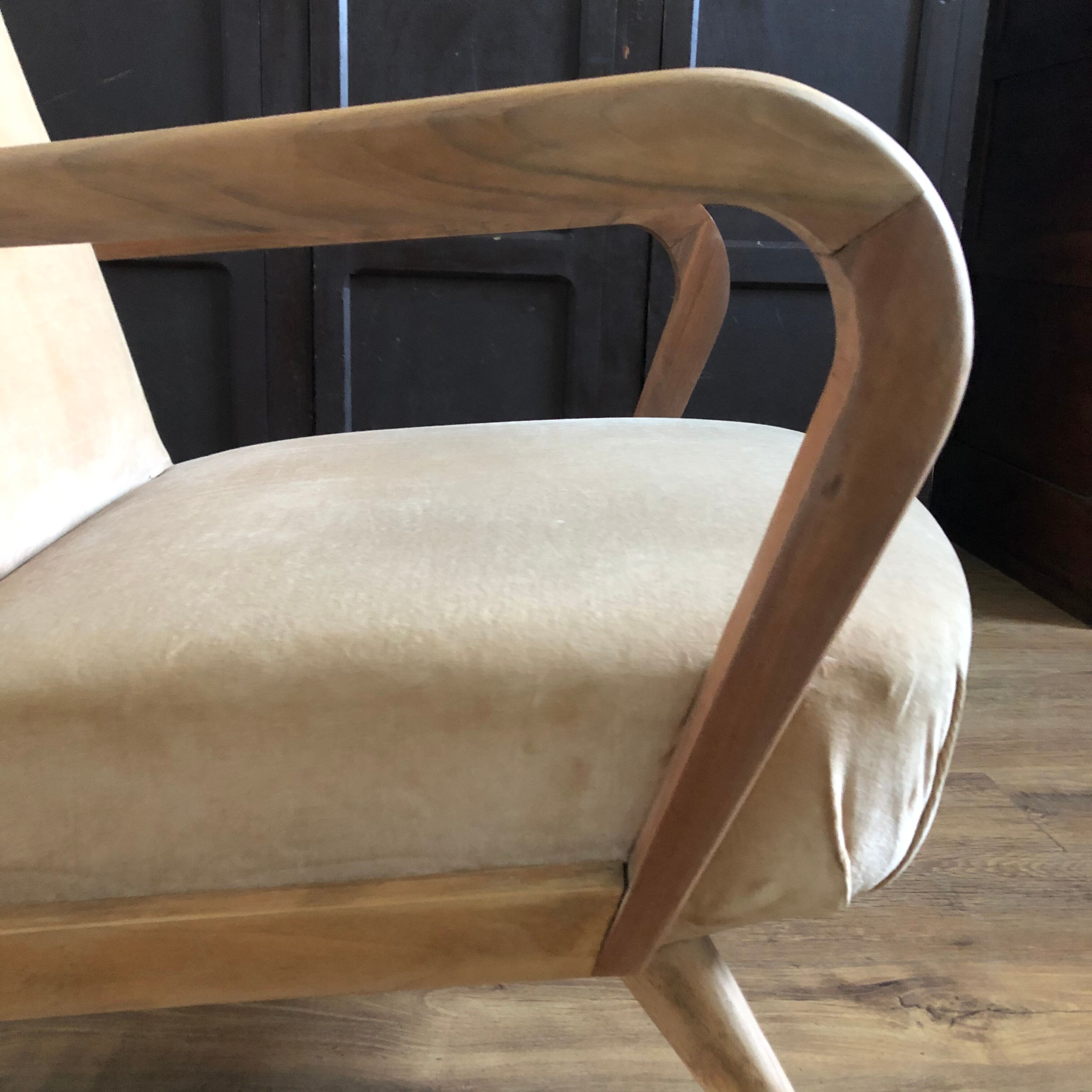 Velvet and wood armchair