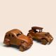 Pair of small handcrafted wooden cars