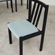 Set of 6 modernist black chairs with light blue-green ribbed fabric.