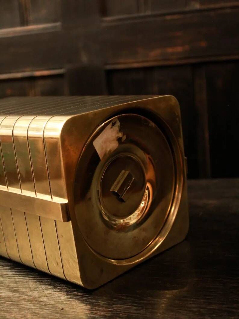 Italian gold-plated bottle cooler, architectural ribbed design.