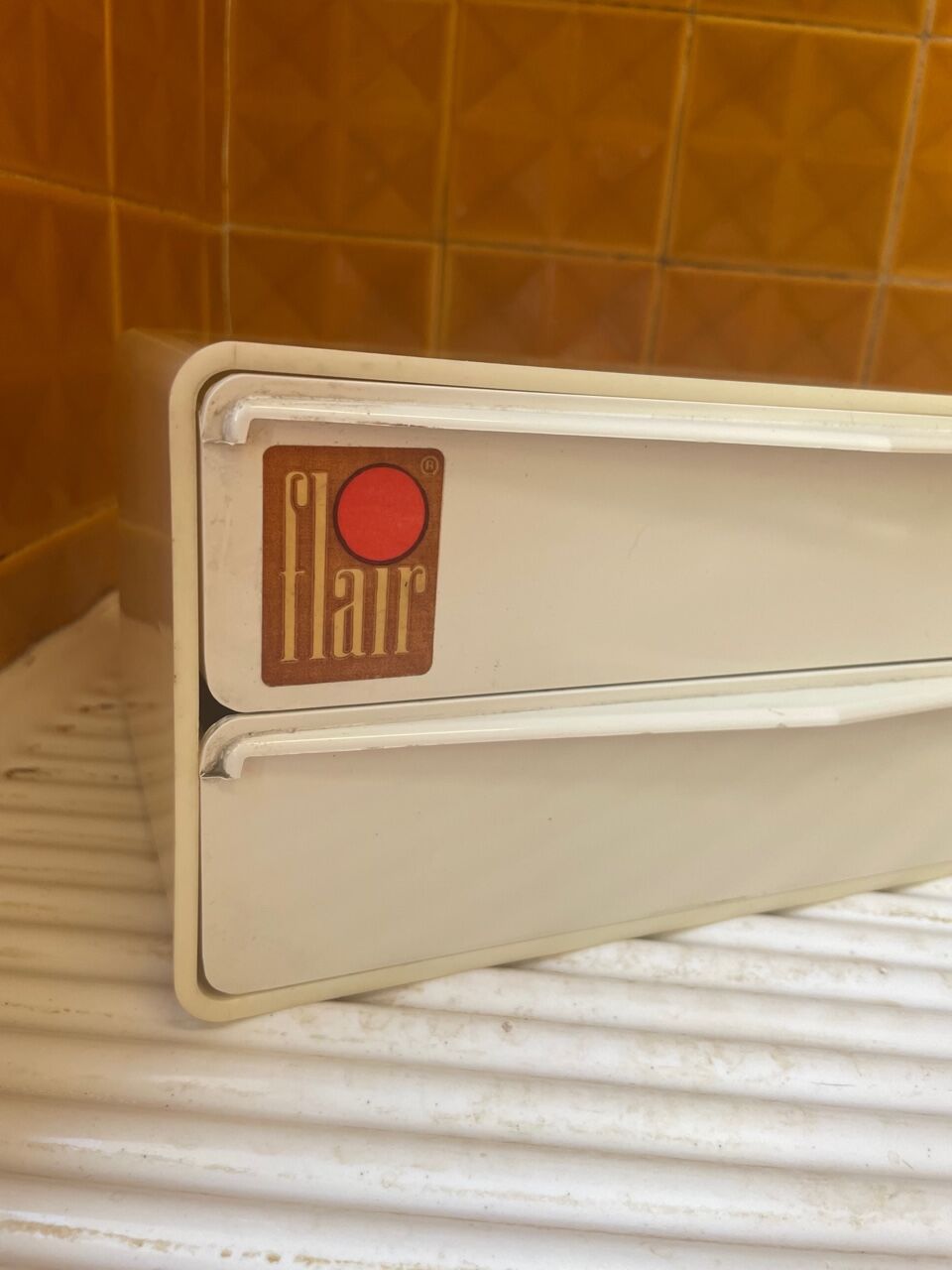 Bakelite white plastic vintage wall storage box with Flair origin label