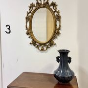 Miroir ovale en or de style baroque par Roberta Wood